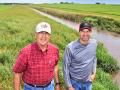 John (left) and son Brian Weber added a water-control structure and tile to establish a saturated buffer to reduce nitrates entering the creek from field tile, Image by Lynn Betts